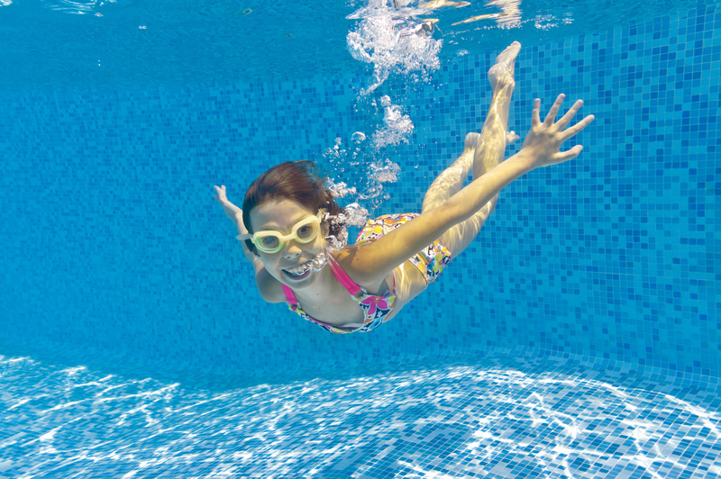 Underwater girl yellow goggles