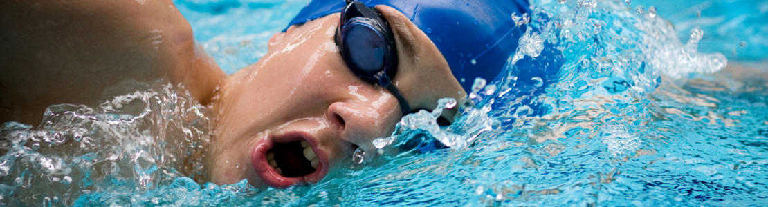 Woman swimming crawl breathing