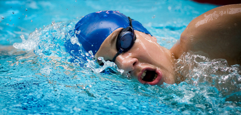 Woman swimming crawl breathing